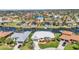 Waterfront property boasts easy access to a scenic canal surrounded by well-maintained homes and lush greenery at 412 Panarea Dr, Punta Gorda, FL 33950