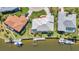 Waterfront neighborhood boasting canal access, private boat docks, and beautifully landscaped yards at 412 Panarea Dr, Punta Gorda, FL 33950