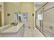 Bathroom featuring a walk-in shower and neutral vanity at 412 Panarea Dr, Punta Gorda, FL 33950