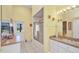 Bright bathroom features a walk-in shower, neutral vanity, and tile floors at 412 Panarea Dr, Punta Gorda, FL 33950