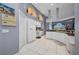 Bright kitchen with white appliances, tile floors, and ample storage space at 412 Panarea Dr, Punta Gorda, FL 33950