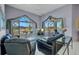 Living room featuring high ceilings, views of the canal, and comfortable seating at 412 Panarea Dr, Punta Gorda, FL 33950