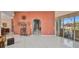 Expansive room with tile floors and a view of the outdoor space, perfect for entertaining at 412 Panarea Dr, Punta Gorda, FL 33950