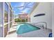 This stunning pool features a screened enclosure for pest-free enjoyment and relaxation at 412 Panarea Dr, Punta Gorda, FL 33950
