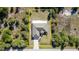 Overhead aerial of home and yard, including the firepit and shed at 422 Ravenswood Blvd, Port Charlotte, FL 33954