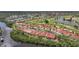 Stunning aerial view of the community, featuring a golf course, lakes, and waterfront homes at 5036 San Rocco Ct, Punta Gorda, FL 33950