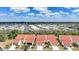 Attractive aerial view of community with canals and well-maintained red tile roofs at 5036 San Rocco Ct, Punta Gorda, FL 33950
