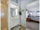 Bright bathroom, with a granite-topped vanity next to the glass enclosed shower at 5036 San Rocco Ct, Punta Gorda, FL 33950
