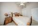 Cozy bedroom with a wood bed frame, carpet, and two bedside tables at 5036 San Rocco Ct, Punta Gorda, FL 33950