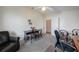 Versatile room perfect as a home office, complete with closet and a cozy reading chair at 5036 San Rocco Ct, Punta Gorda, FL 33950