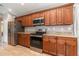 Well-equipped kitchen with stainless steel appliances, granite countertops, and ample cabinet space at 5125 Ariton Rd, North Port, FL 34288
