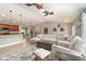 Open concept living area featuring the kitchen, dining area, and living room for easy entertaining at 5125 Ariton Rd, North Port, FL 34288