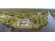 This waterfront home sits on a point, with canal access and private pool at 535 Ramblewood St, Port Charlotte, FL 33953