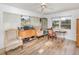 Bright home office space with multiple windows, wood floors, and a view of the water at 535 Ramblewood St, Port Charlotte, FL 33953