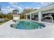 Inviting pool area with a picturesque waterfront view at 535 Ramblewood St, Port Charlotte, FL 33953