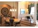 Formal dining room with a piano, elegant chandelier, and views of the surrounding neighborhood at 850 Napoli Ln, Punta Gorda, FL 33950