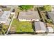 Aerial view of the backyard with a shed and a partial fence at 102 21St Ne St, Bradenton, FL 34208