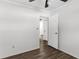 This bedroom has wood-look floors and an open doorway at 102 21St Ne St, Bradenton, FL 34208