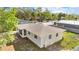 Aerial view of the home's exterior showcasing the roof and layout at 102 21St Ne St, Bradenton, FL 34208
