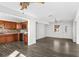 Open-concept kitchen and living area featuring sleek floors, and ample natural light at 102 21St Ne St, Bradenton, FL 34208