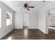 Inviting living area showcasing wood-look floors and an open floor plan at 102 21St Ne St, Bradenton, FL 34208