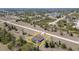Aerial view of property showing house, pool, surrounding neighborhood, and large lot at 145 Brig E Cir, Placida, FL 33946