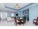 Open floorplan with dining area adjacent to living room with stylish furniture and ample lighting at 145 Brig E Cir, Placida, FL 33946