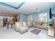 Stylish open-concept living room featuring modern furnishings, open floor plan, and plenty of natural light at 145 Brig E Cir, Placida, FL 33946