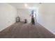 Spacious bonus room with workout equipment and natural light from a window at 15172 Mcgraw Ave, Port Charlotte, FL 33953