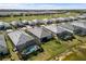 Stunning aerial showcasing waterfront homes with screened in pools, and picturesque landscaping at 15931 Sugar Hill Dr, Punta Gorda, FL 33982