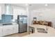 Modern kitchen featuring stainless steel appliances and tile backsplash at 15931 Sugar Hill Dr, Punta Gorda, FL 33982