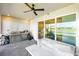Outdoor kitchen featuring a built-in grill, sink, and ample counter space for cooking and entertaining at 15931 Sugar Hill Dr, Punta Gorda, FL 33982