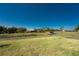 Expansive backyard offers plenty of space for outdoor activities, with a tranquil pond adding to the overall appeal at 17476 Vellum Cir, Punta Gorda, FL 33955