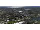 Breathtaking aerial shot of a canal-filled residential community surrounded by lush greenery at 18427 Goodman Cir, Port Charlotte, FL 33948