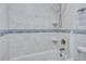 Bathroom showcasing updated fixtures, and a shower/tub combination at 18427 Goodman Cir, Port Charlotte, FL 33948