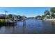 Waterfront canal community view, highlighting private docks and boat lifts at 18427 Goodman Cir, Port Charlotte, FL 33948