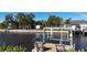 Waterfront property with private dock and boat lift, offering direct access to the canal and beautiful views at 18427 Goodman Cir, Port Charlotte, FL 33948
