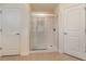 Bathroom with glass shower and tile floors at 2132 Nuremberg Blvd, Punta Gorda, FL 33983