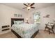 Bright bedroom featuring coastal decor, ceiling fan and natural light from the window at 2132 Nuremberg Blvd, Punta Gorda, FL 33983