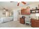 Bedroom with adjoining home office, ceiling fan, and neutral color scheme at 2132 Nuremberg Blvd, Punta Gorda, FL 33983