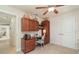 A functional home office space with built-in desk, cabinets, and natural light at 2132 Nuremberg Blvd, Punta Gorda, FL 33983