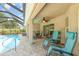 Screened-in lanai with lounge chairs and pool access, perfect for outdoor enjoyment at 2132 Nuremberg Blvd, Punta Gorda, FL 33983