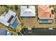 Aerial shot of waterfront homes featuring private docks and pools, nestled in a desirable canal community at 2350 W Marion Ave, Punta Gorda, FL 33950