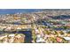 Panoramic aerial view of a waterfront residential community with canals and stunning ocean views at 2350 W Marion Ave, Punta Gorda, FL 33950