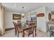 Dining room featuring a wood table and chairs plus a decorative light fixture at 2350 W Marion Ave, Punta Gorda, FL 33950