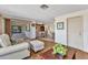 Open-concept living area showcasing seamless flow between living, dining, and kitchen spaces at 2350 W Marion Ave, Punta Gorda, FL 33950