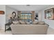 Cozy living room with comfortable seating, a view of the canal, and a peaceful atmosphere at 2350 W Marion Ave, Punta Gorda, FL 33950