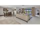 Open-concept living area and dining room with tile floors, comfortable seating, and views of the canal at 2350 W Marion Ave, Punta Gorda, FL 33950