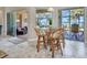 Bright breakfast nook featuring waterfront views and access to the lanai at 2917 Mill Creek Rd, Port Charlotte, FL 33953