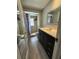 Bathroom featuring a tiled walk-in shower at 3308 Pinetree St, Port Charlotte, FL 33952